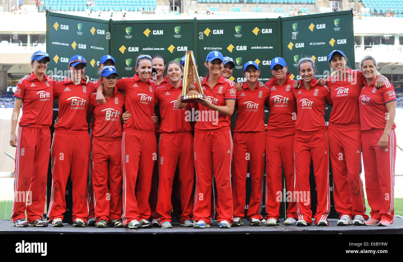 The England Women's Twenty20 (T20) cricket team celebrate reataining