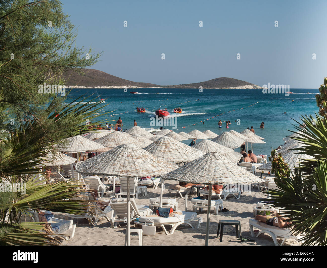 Cesme, Turkey,  August 2nd, 2014: Tourist beach on the Cesme peninsula in high season. Stock Photo