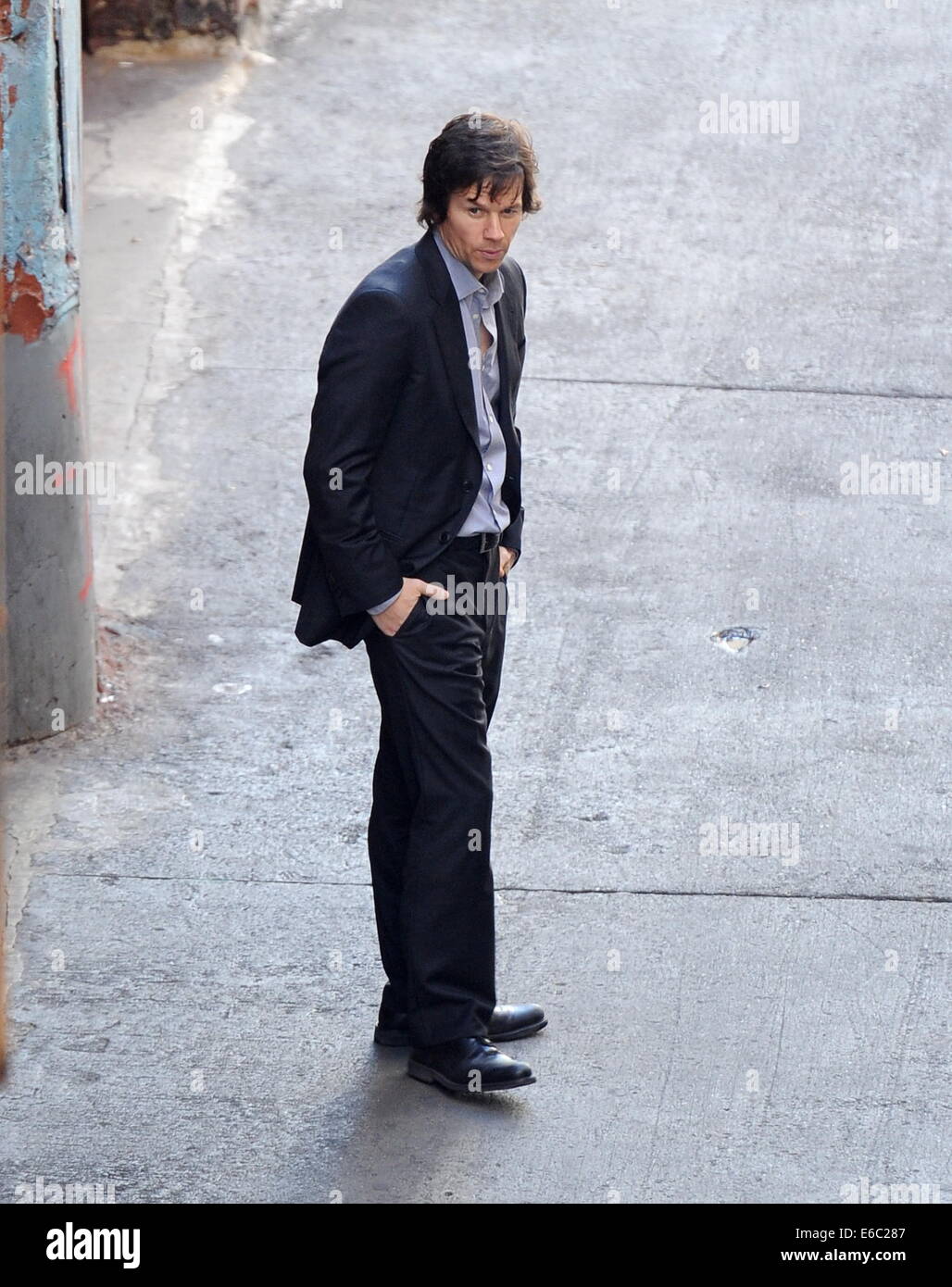 Actor Mark Wahlberg spotted getting a little roughed up by co star Michael Williams for their new flick 'The Gambler' filming in downtown Los Angeles.  Featuring: Mark Wahlberg Where: Los Angeles, California, United States When: 03 Feb 2014 Stock Photo