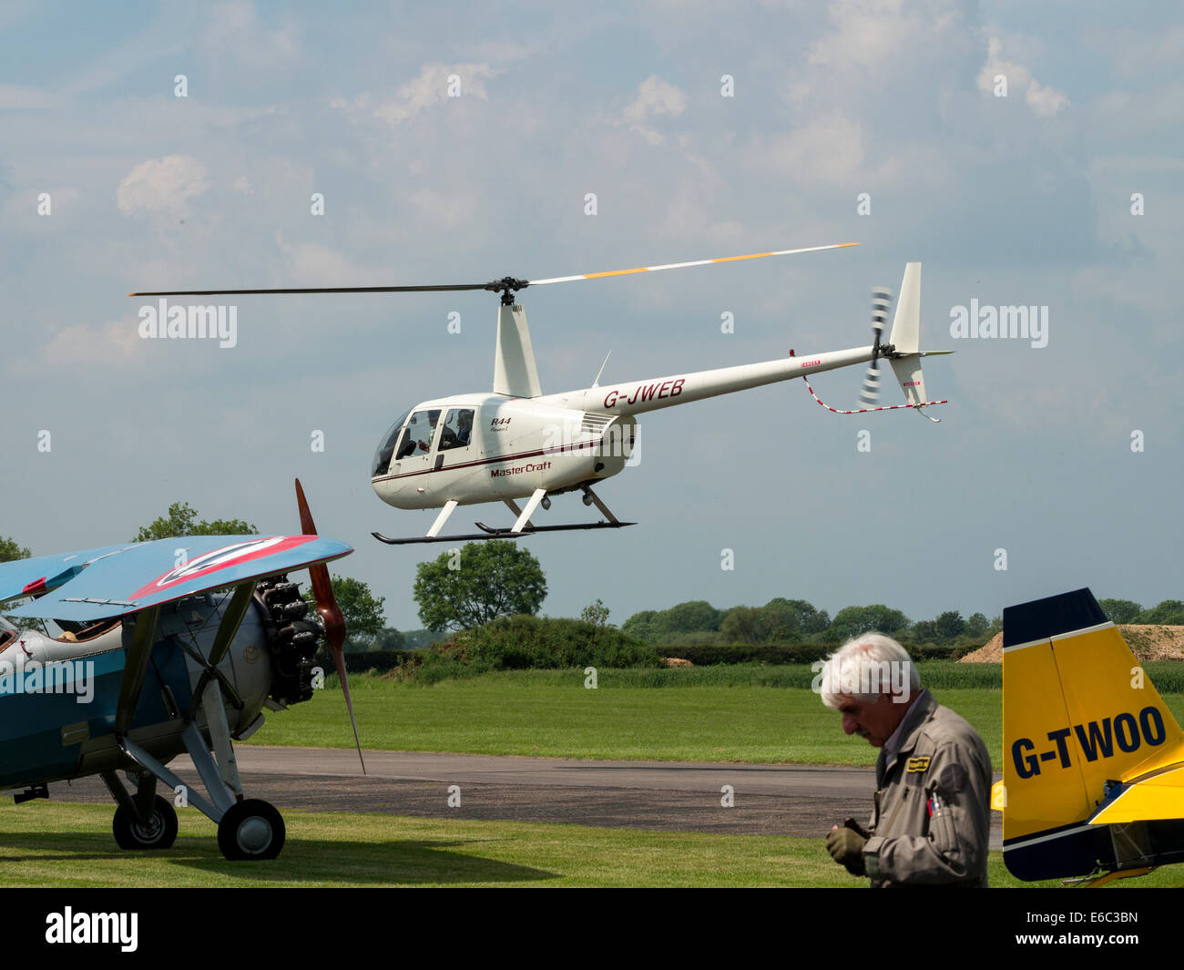 british Robinson R22 pilot training helicopter at Breighton airfield,yorkshire,uk Stock Photo