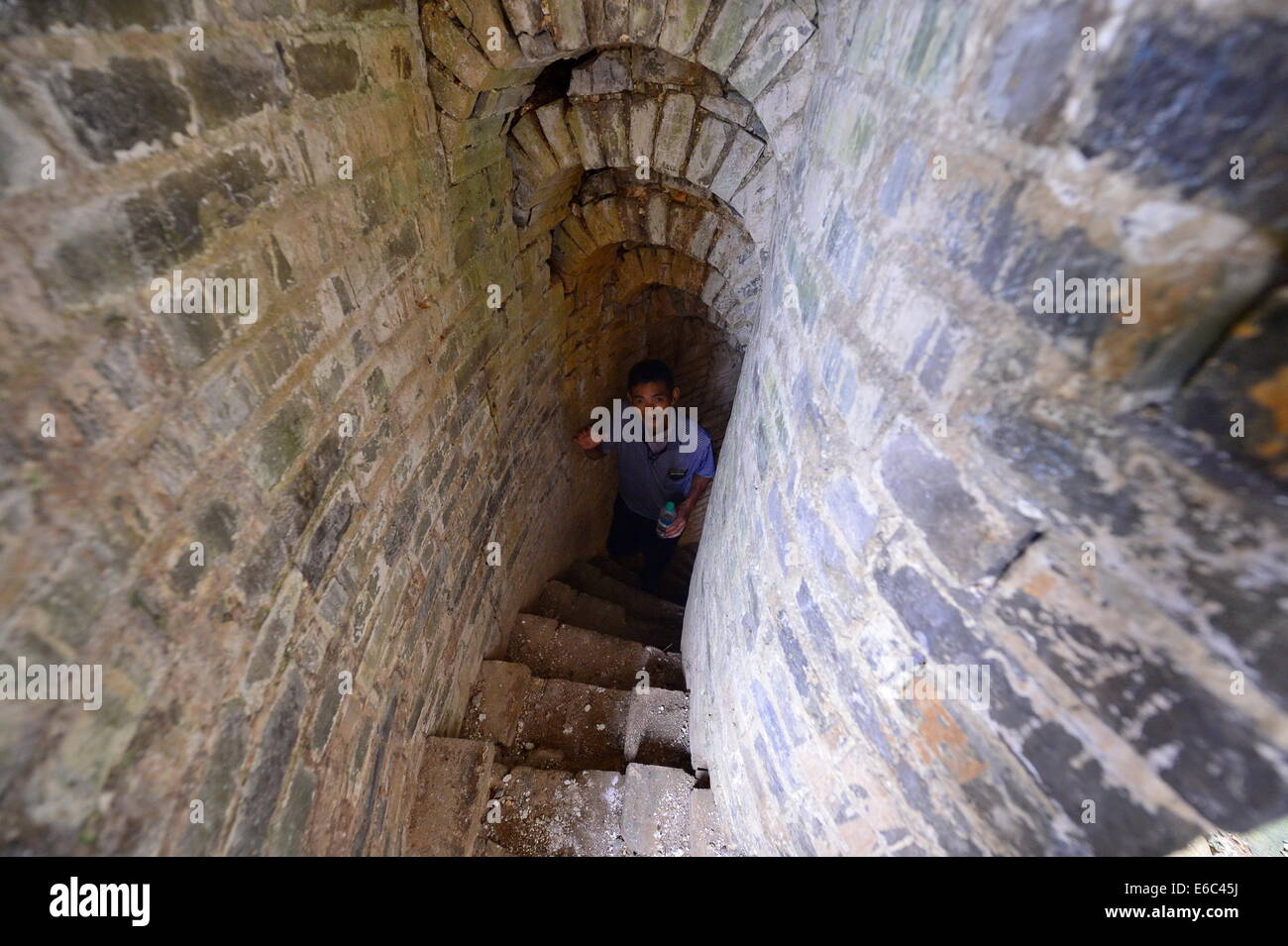 Dexing, China's Jiangxi Province. 19th Aug, 2014. A tourist explores