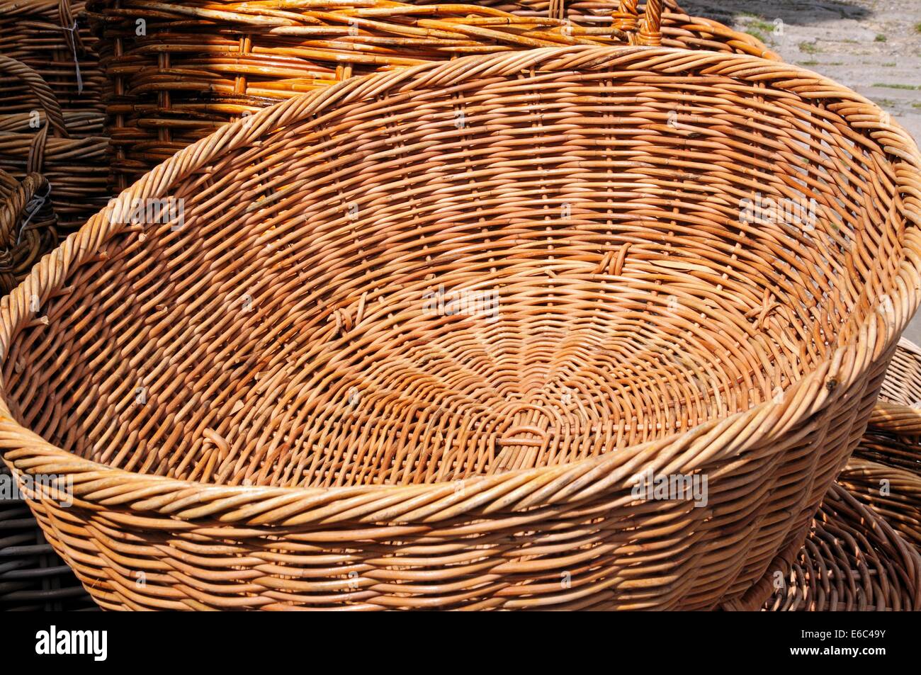 Traditional wicker baskets for sale outside a shop along the High