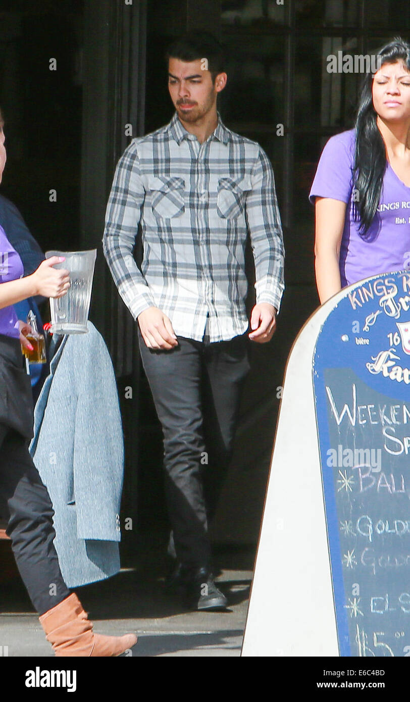 Joe jonas out and about with his friend hires stock photography and