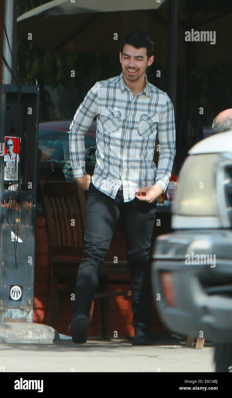 Joe jonas out and about with his friend hires stock photography and