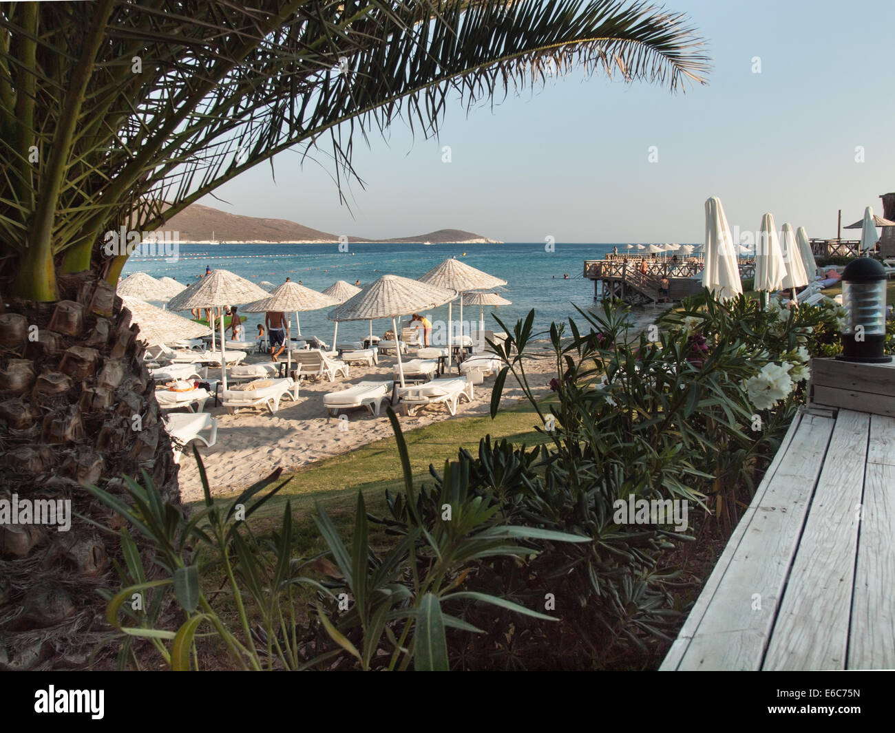 Cesme, Turkey,  August 2nd, 2014: Tourist beach on the Cesme peninsula in high season. Stock Photo