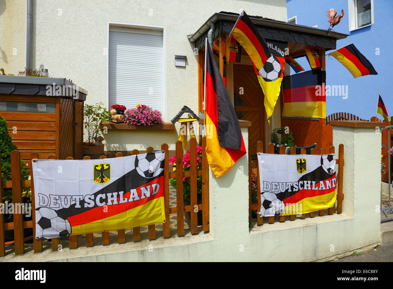 football, 2014 FIFA World Cup Brazil, German national team, national colours, residential house, house entrance of a German football fan decorated with German national flags, D-Muelheim an der Ruhr, Ruhr area, North Rhine-Westphalia, NRW Stock Photo