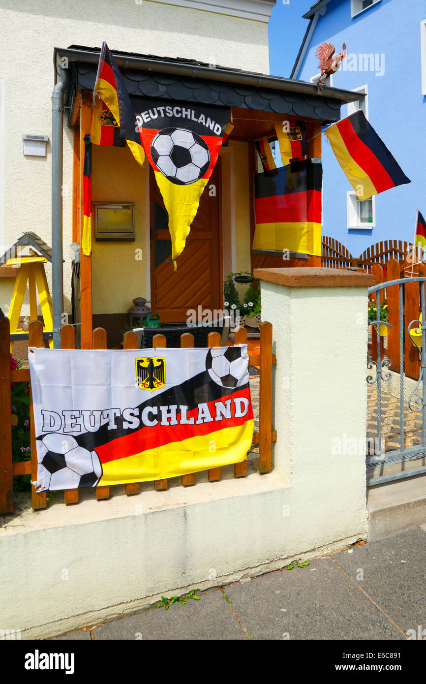 football, 2014 FIFA World Cup Brazil, German national team, national colours, residential house, house entrance of a German football fan decorated with German national flags, D-Muelheim an der Ruhr, Ruhr area, North Rhine-Westphalia, NRW Stock Photo