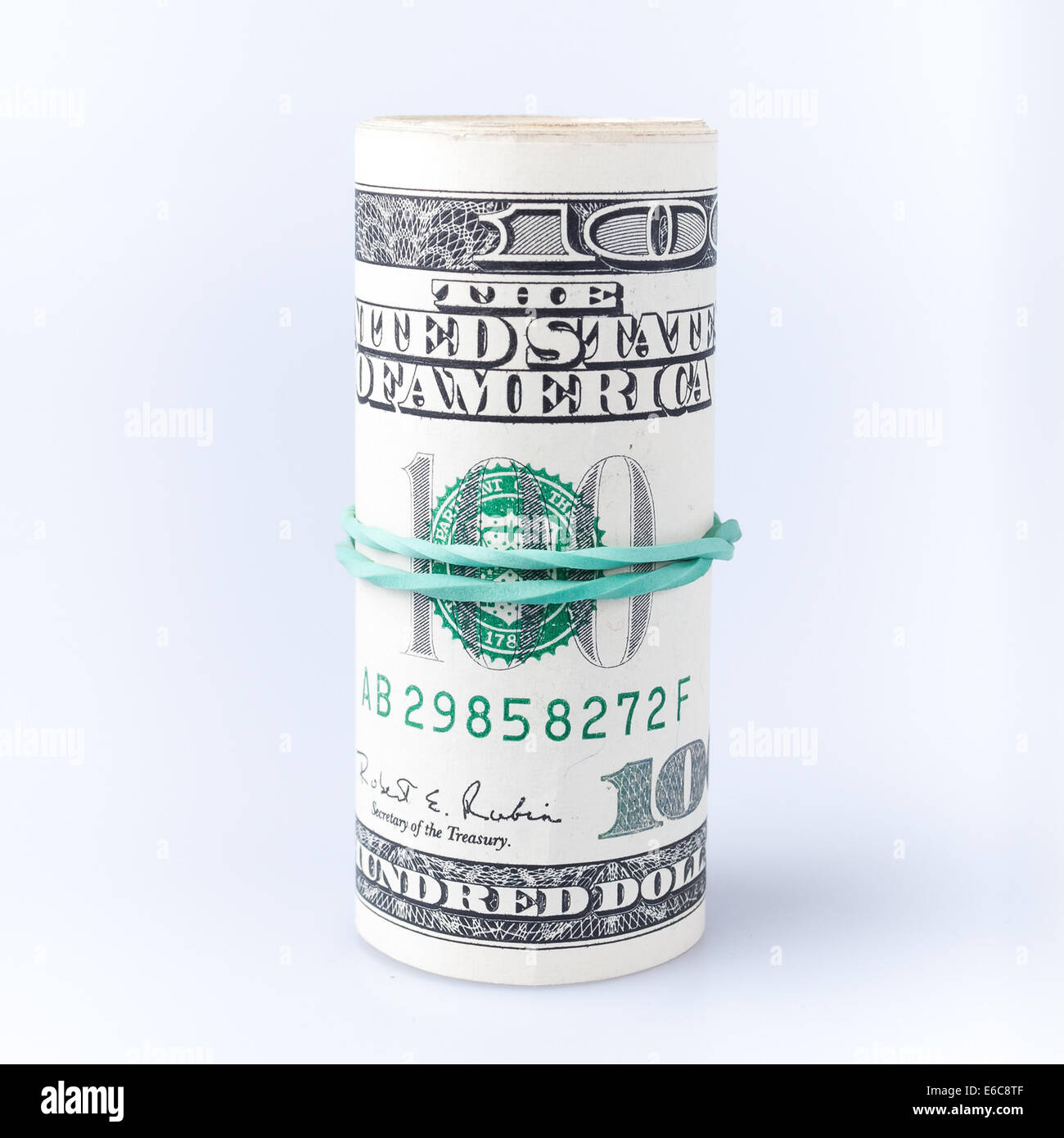 Roll of dollars on a white background Stock Photo