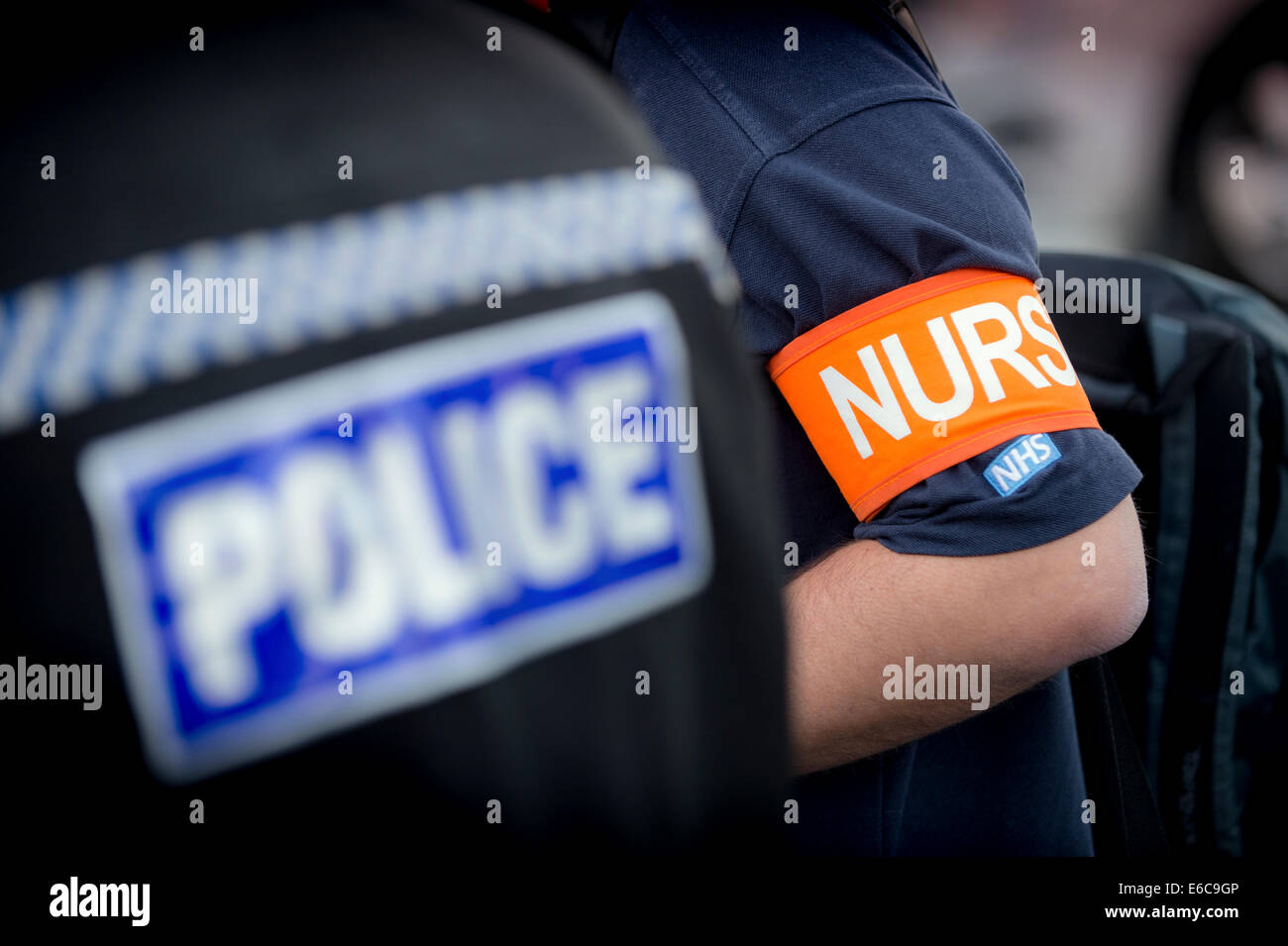 An on-street triage nurse on duty with Police in the UK. Stock Photo