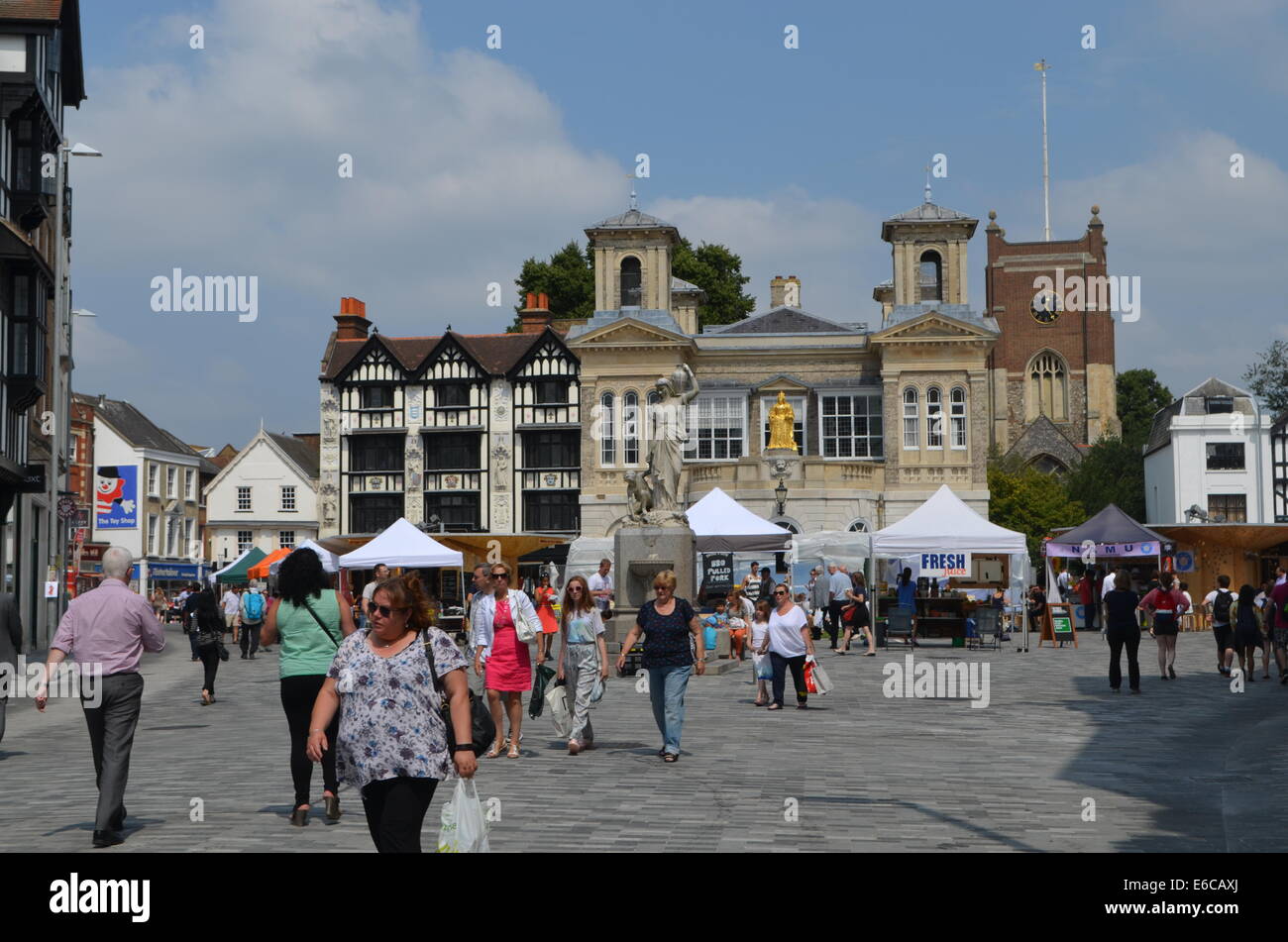 RoyalBorough KingstononThames marketplace with its ancient buildings and street marketeers gets ready for aday of selling&buying Stock Photo