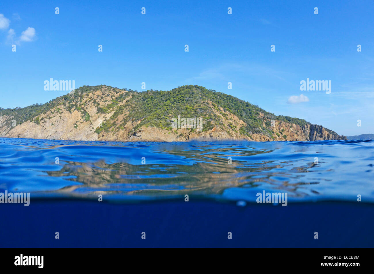 Island and water surface (split shot), half underwater, Port-Cros island, Var, Provence, France Stock Photo