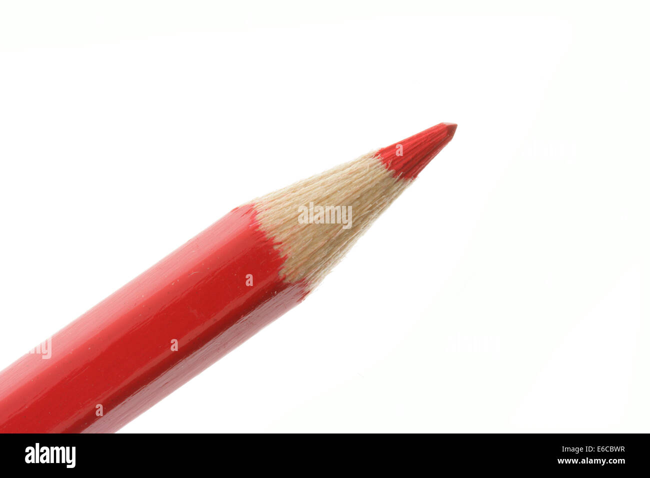 Red pencil close-up isolated over white background Stock Photo