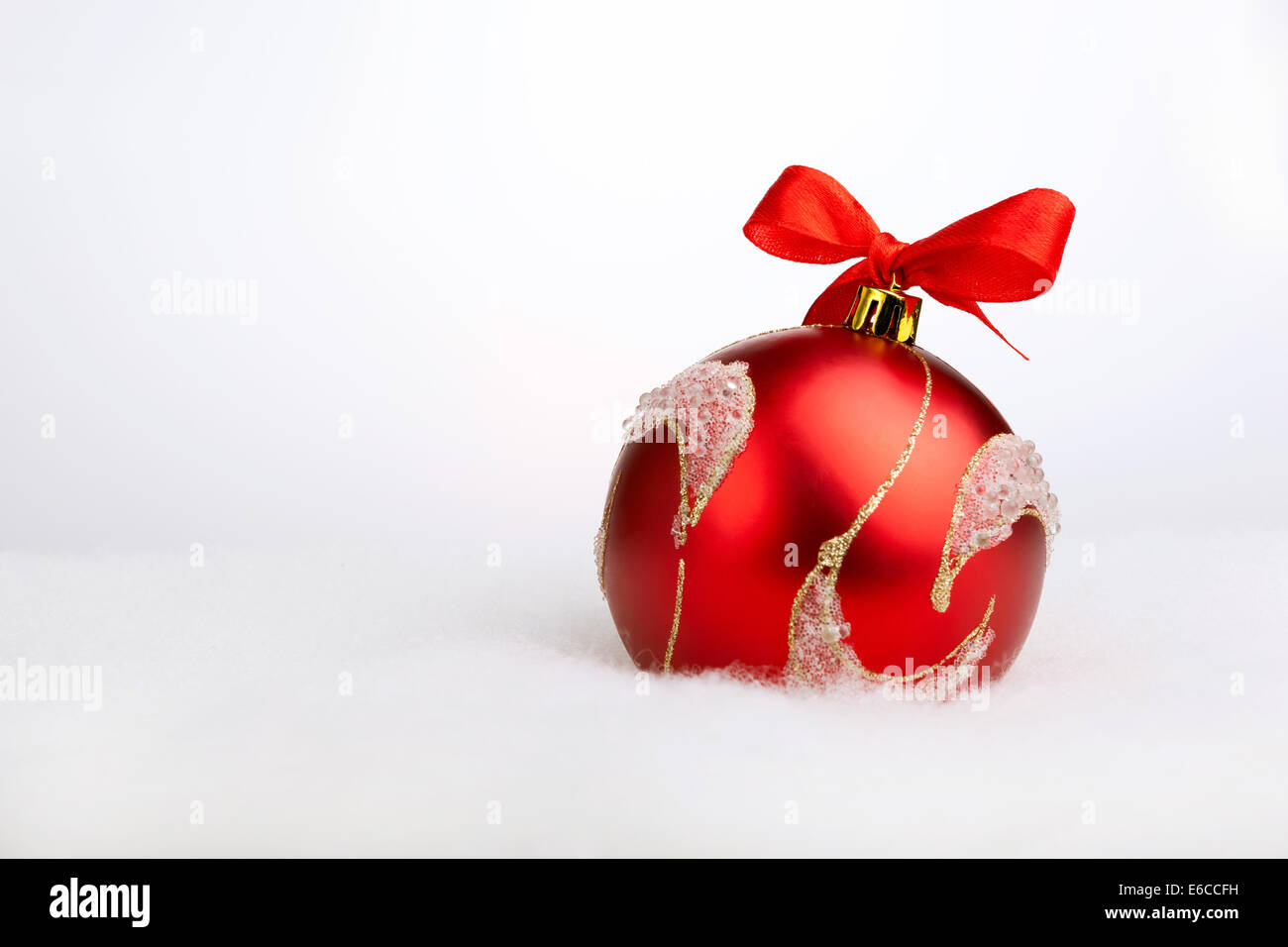 Glittering red christmas ball on the white color background Stock Photo Alamy