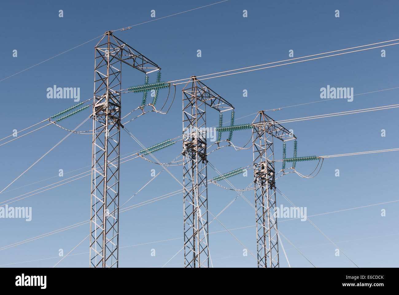 Power line towers and blue sky Stock Photo - Alamy