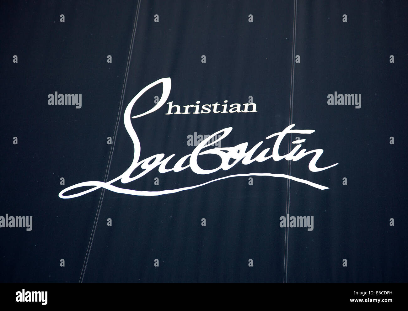 Logo on Christian Louboutin shoe shop in Mayfair, London Stock Photo - Alamy