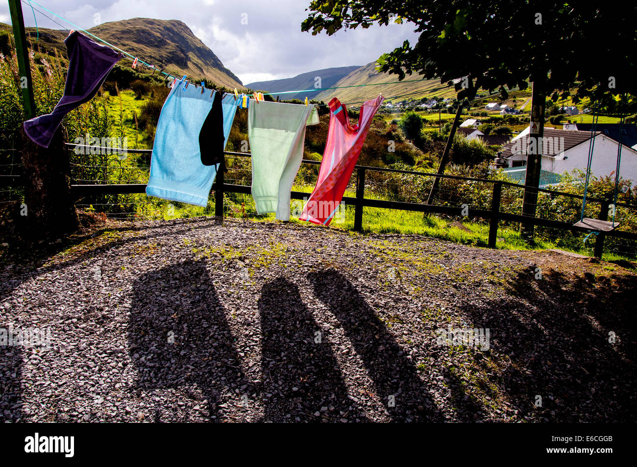 Washing drying on line in rural Ireland landscape Stock Photo