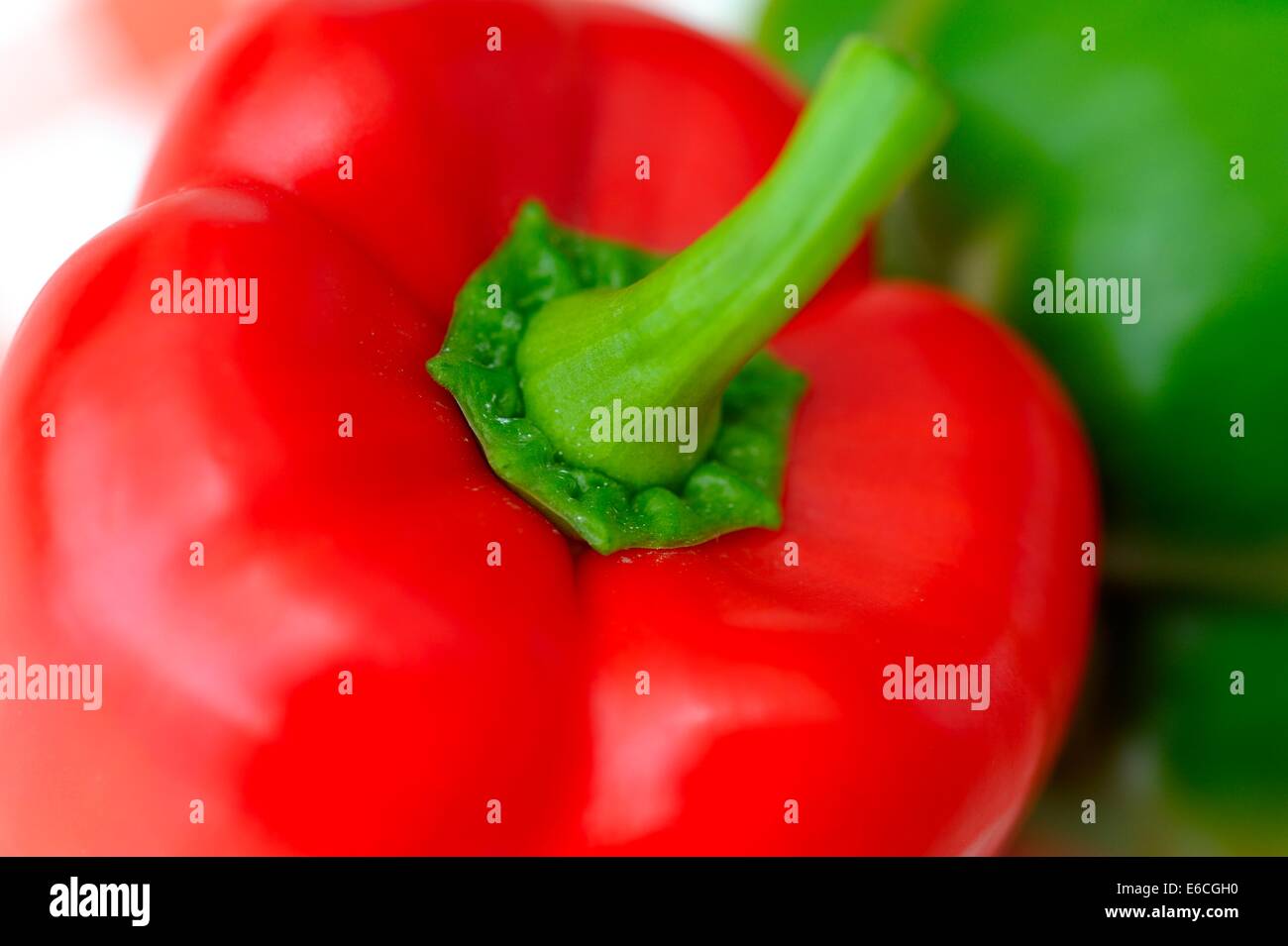 A red and green bell pepper Stock Photo - Alamy