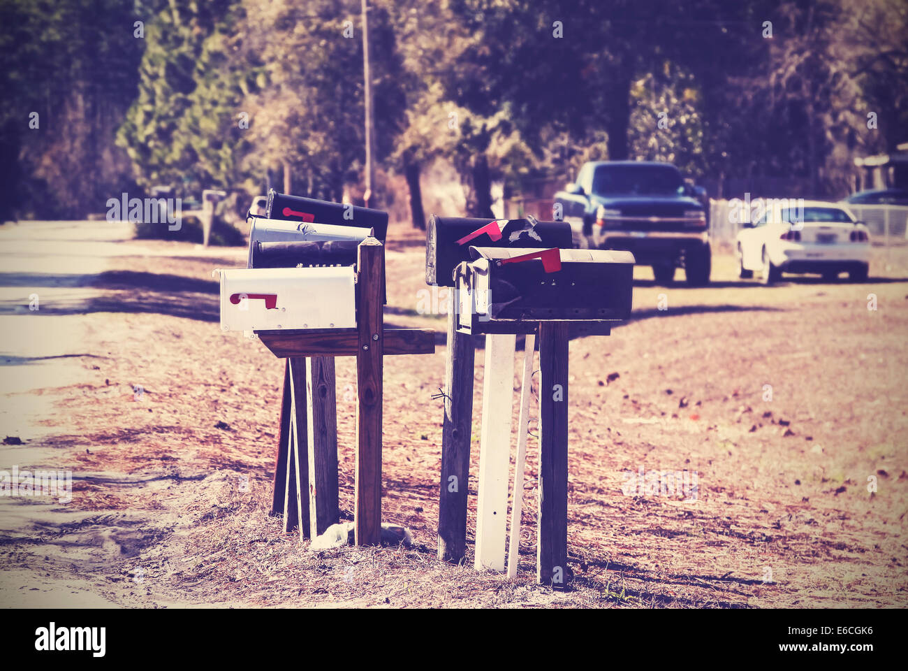 Vintage picture of mail boxes, rural area, USA. Stock Photo