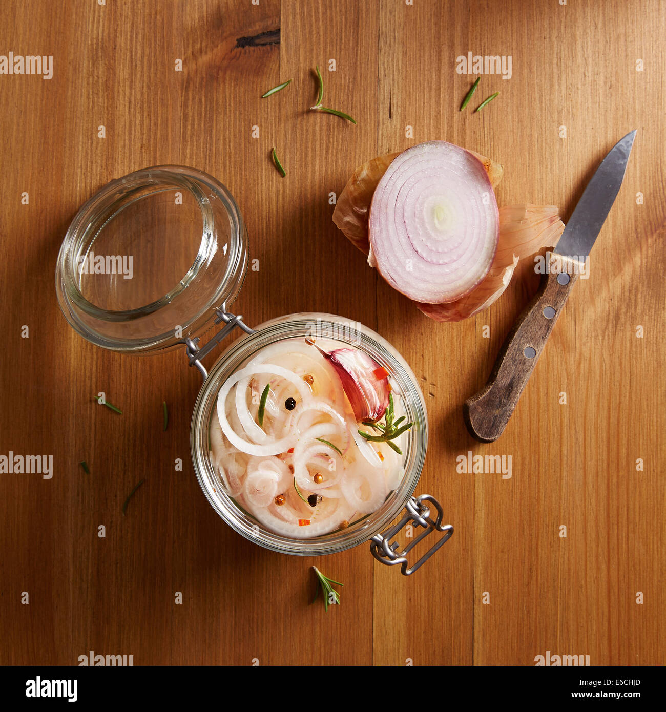 Homemade pickled onions with spice and garlic in a jar Stock Photo