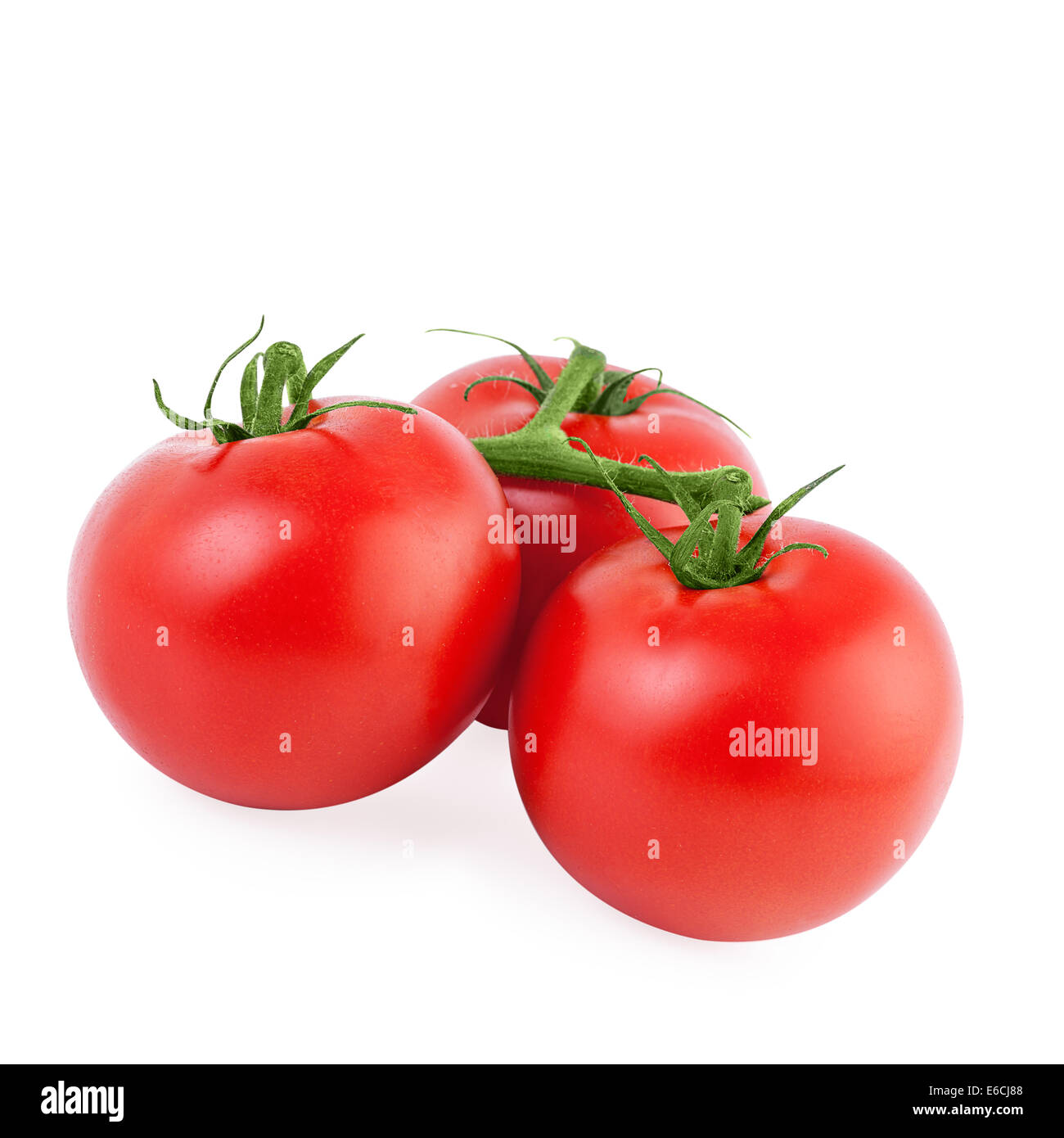 three ripe tomato isolated on white background Stock Photo - Alamy