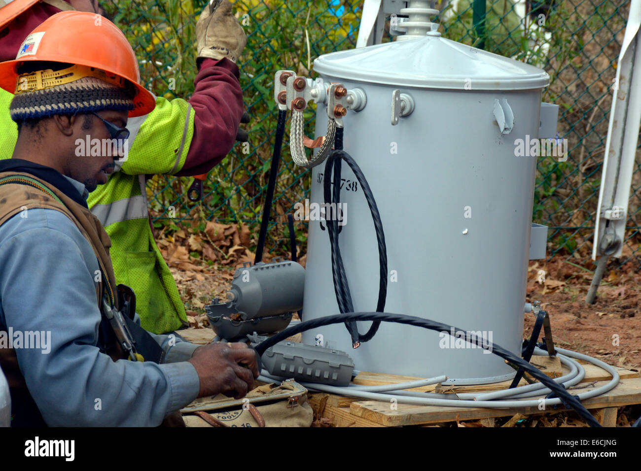 utility workers work  on a transformer in Greenbelt, Maryland Stock Photo