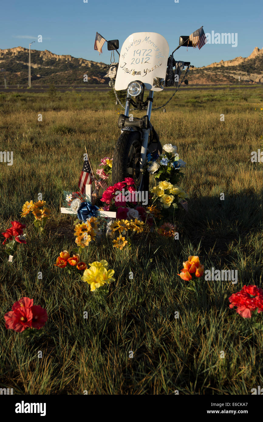 The front end of the motorcycle of a man who died in a traffic accident is used a makeshift memorial in Gallup, New Mexico. Stock Photo