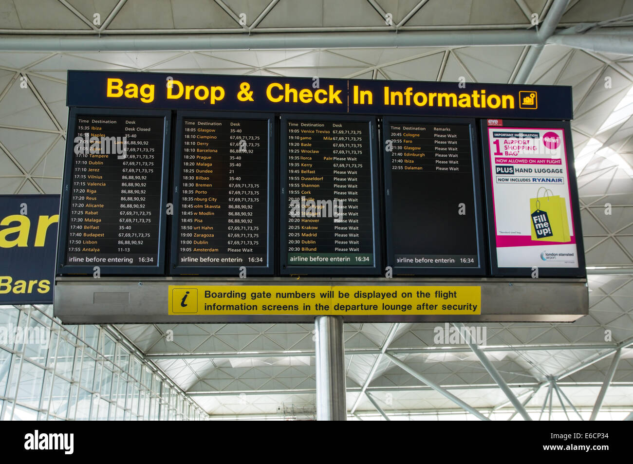 Flight information board at London Stansted Airport Essex England United Kingdom UK Stock Photo