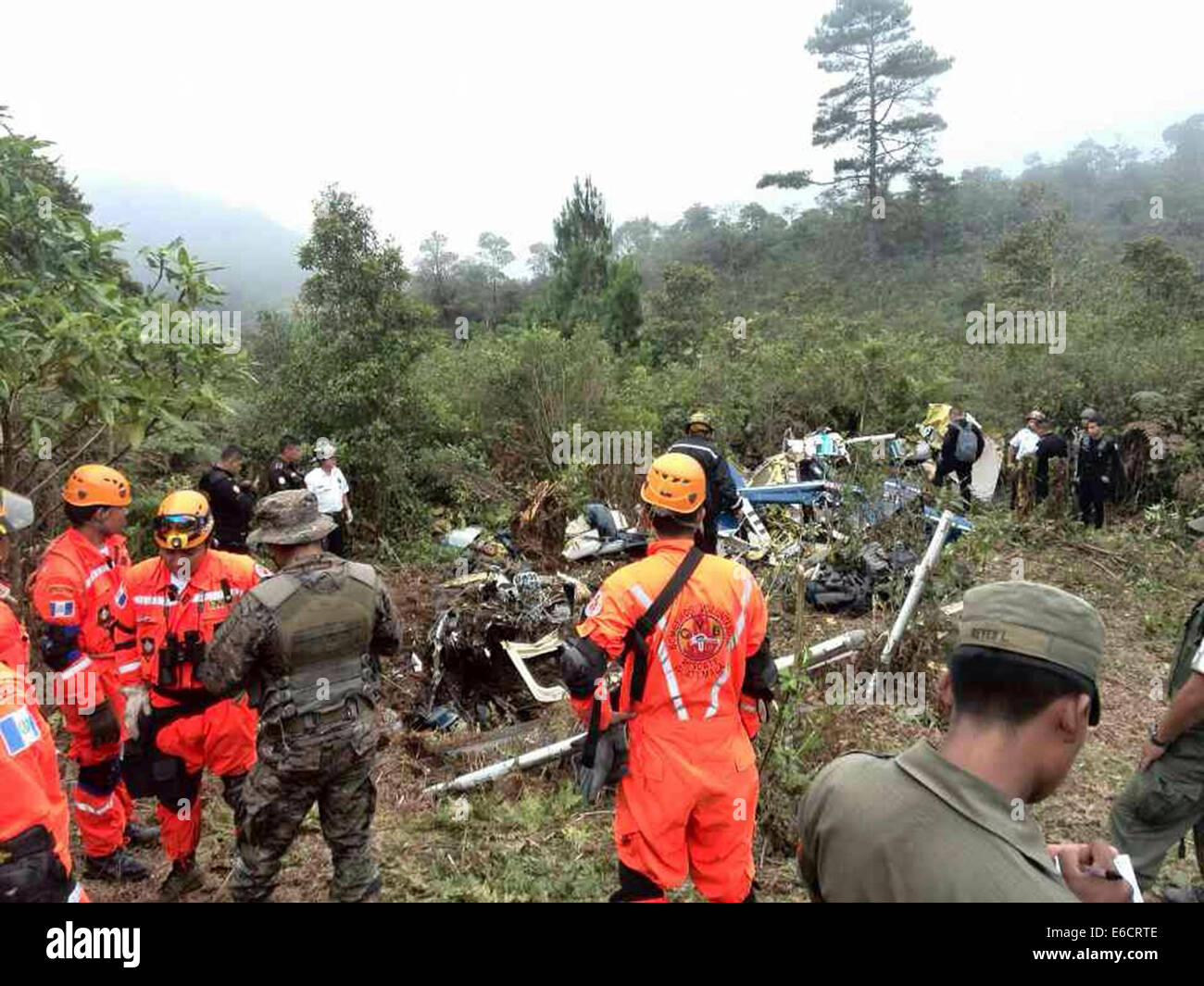 Guatemala City, Guatemala. 20th Aug, 2014. Image provided by the Meritorious Volunteer Fire Department shows the crashed site of an helicopter carrying General Rudy Israel Ortiz, National Defense Chief of Staff, in the municipality of Nenton, Huehuetenango department, Guatemala, on Aug. 20, 2014. Guatemalan President Otto Perez Molina on Wednesday lamented the death of one of the country's three top military commanders, National Defense Chief of Staff Gen. Rudy Israel Ortiz. Credit:  Meritorious Volunteer Fire Department/Xinhua/Alamy Live News Stock Photo