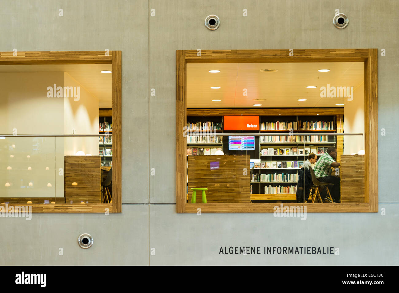 Readers in The Eemhuis in Amersfoort, Netherlands. The building is a cultural centre that combining a library, the art school, t Stock Photo