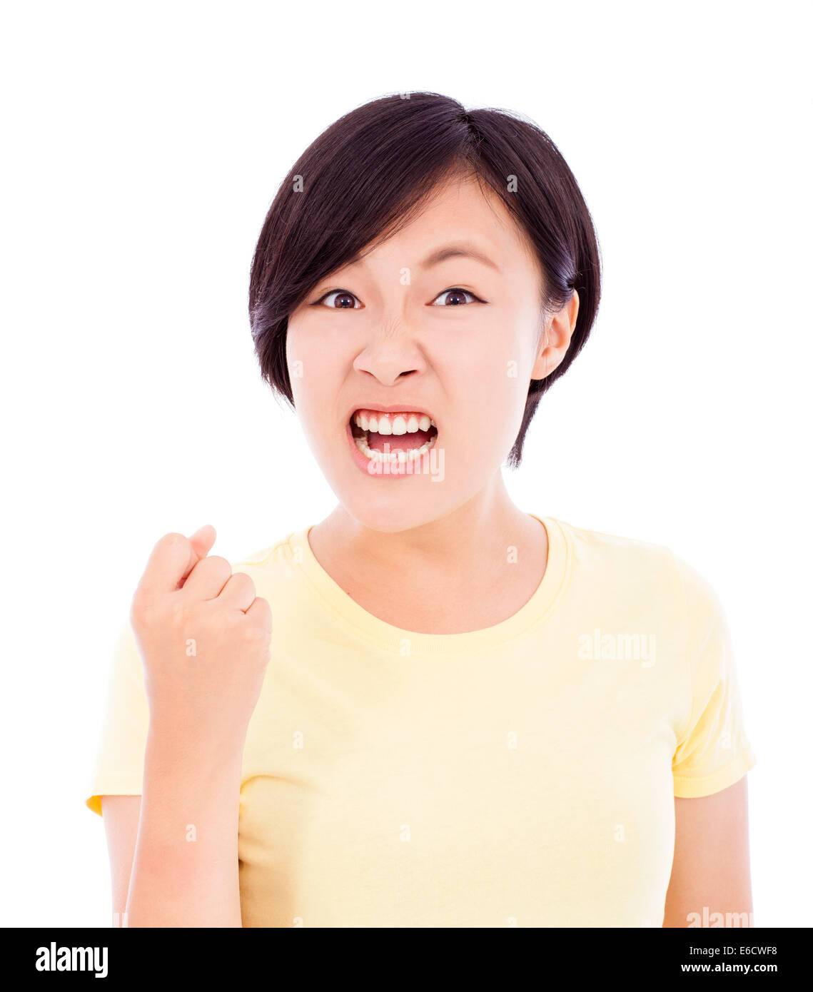 closeup of young girl angry facial expression Stock Photo