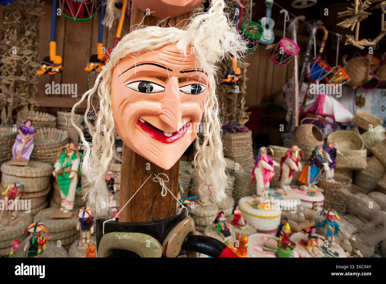 Bit of a bad hair day for a mask that is used in the popular Old Man's Dance in a market in Patzcuaro, Michoacan, Mexico. Stock Photo