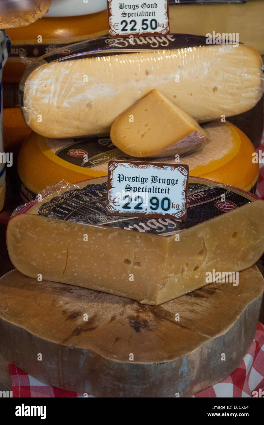 Local Flemish cheeses for sale in a specialty store, Bruges, Belgium Stock Photo