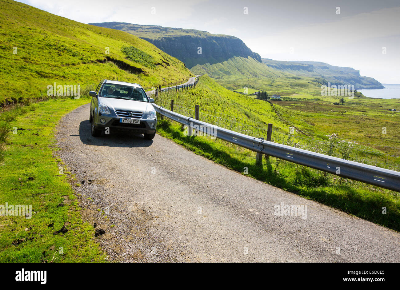 A car on the single track road below Ben More, a Munro on the Isle of Mull, Scotland, UK. Stock Photo