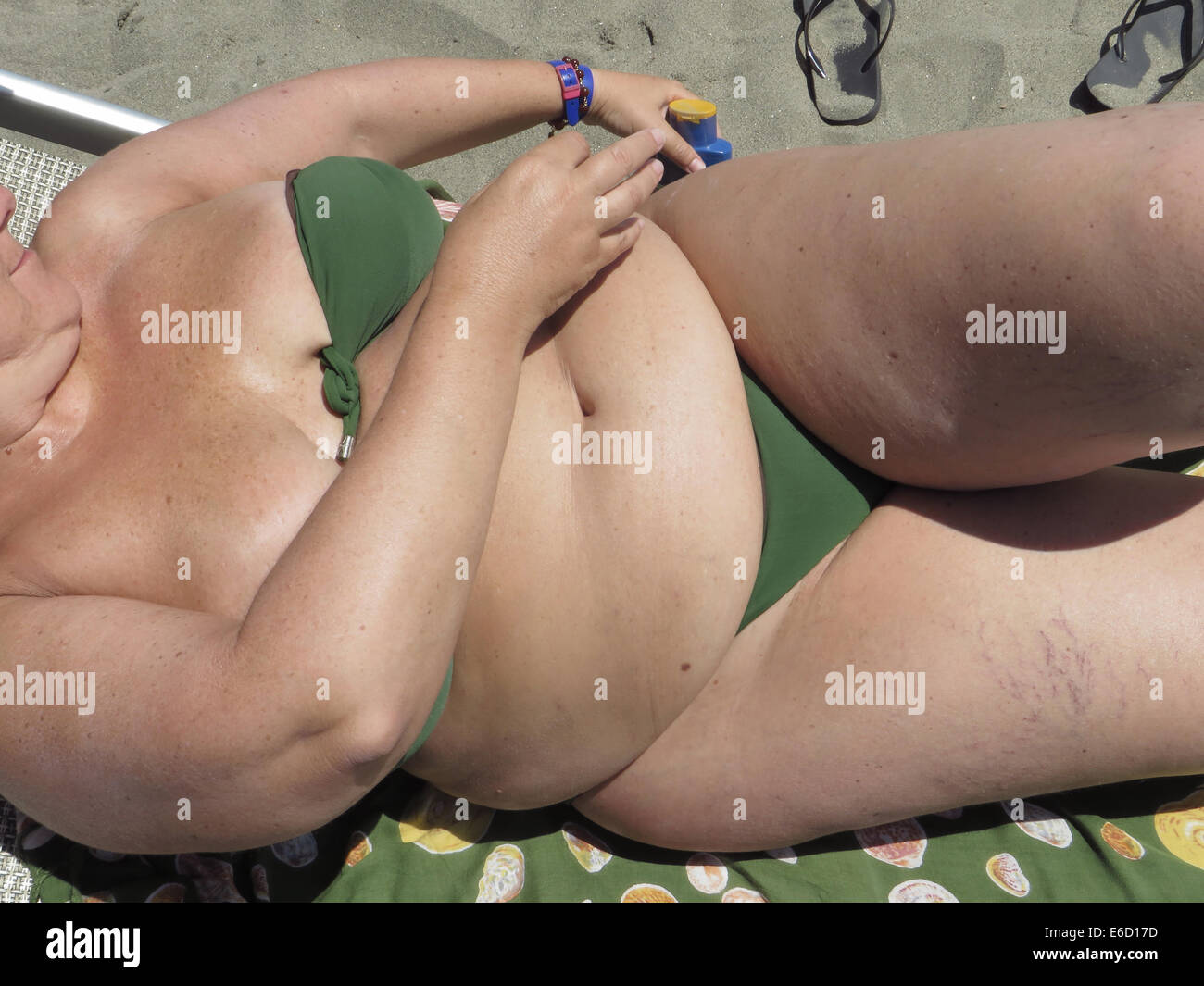 middle age overweight woman in bikini Stock Photo