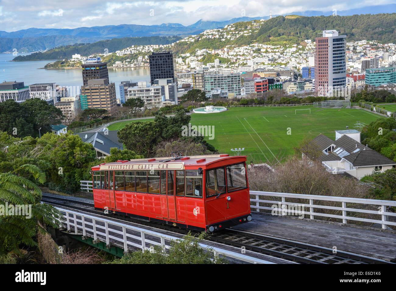 wellington cable car wellington new zealand tram on tracks and buffer of cart with wellington sign and view over the bay Stock Photo