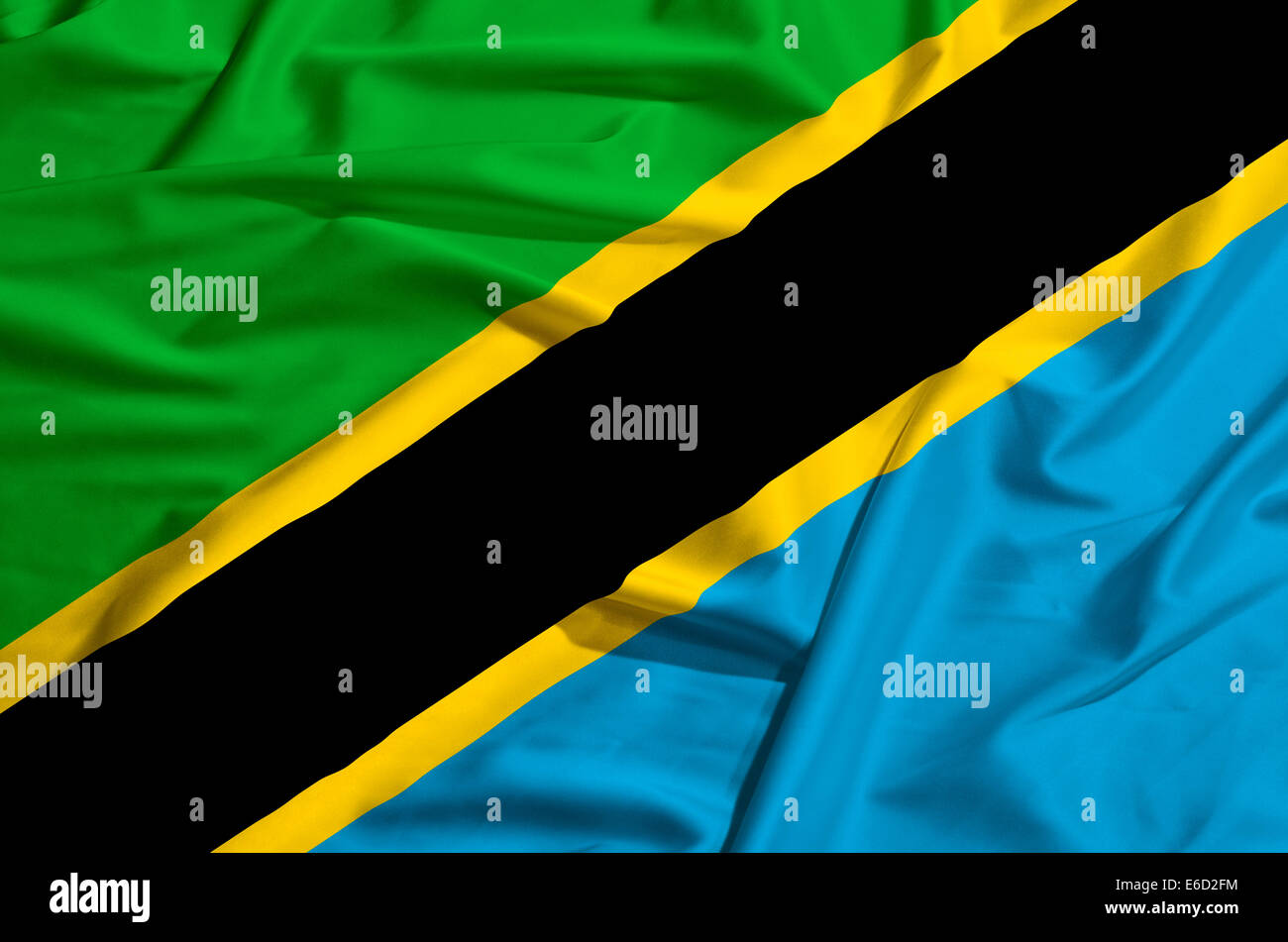 Tanzania flag on a silk drape waving Stock Photo