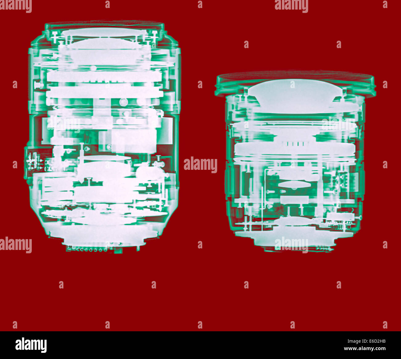 Camera lens under x-ray. the optical elements can be seen. Nikkor 105mm Micro (left) Sigma 10-20mm zoom (right) Stock Photo