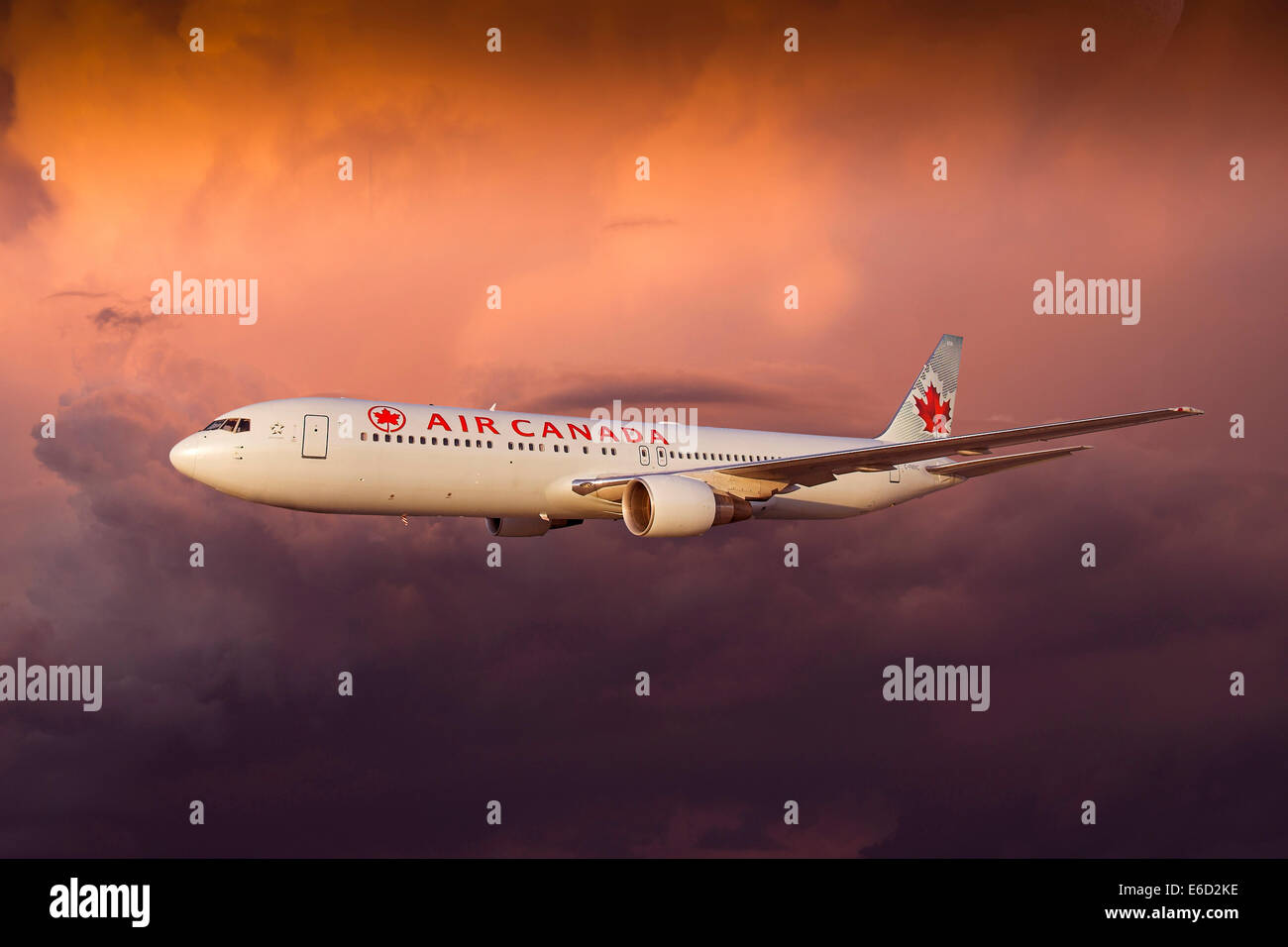 Air Canada Boeing 767333 ER in flight in a storm Stock Photo Alamy