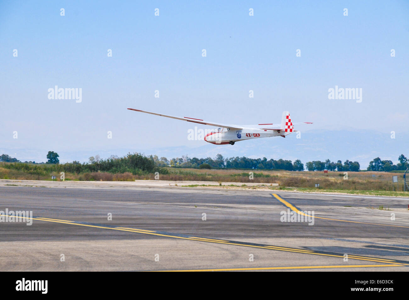 Glider lands at an airstrip Photographed at Rosh Pinna Israel Stock