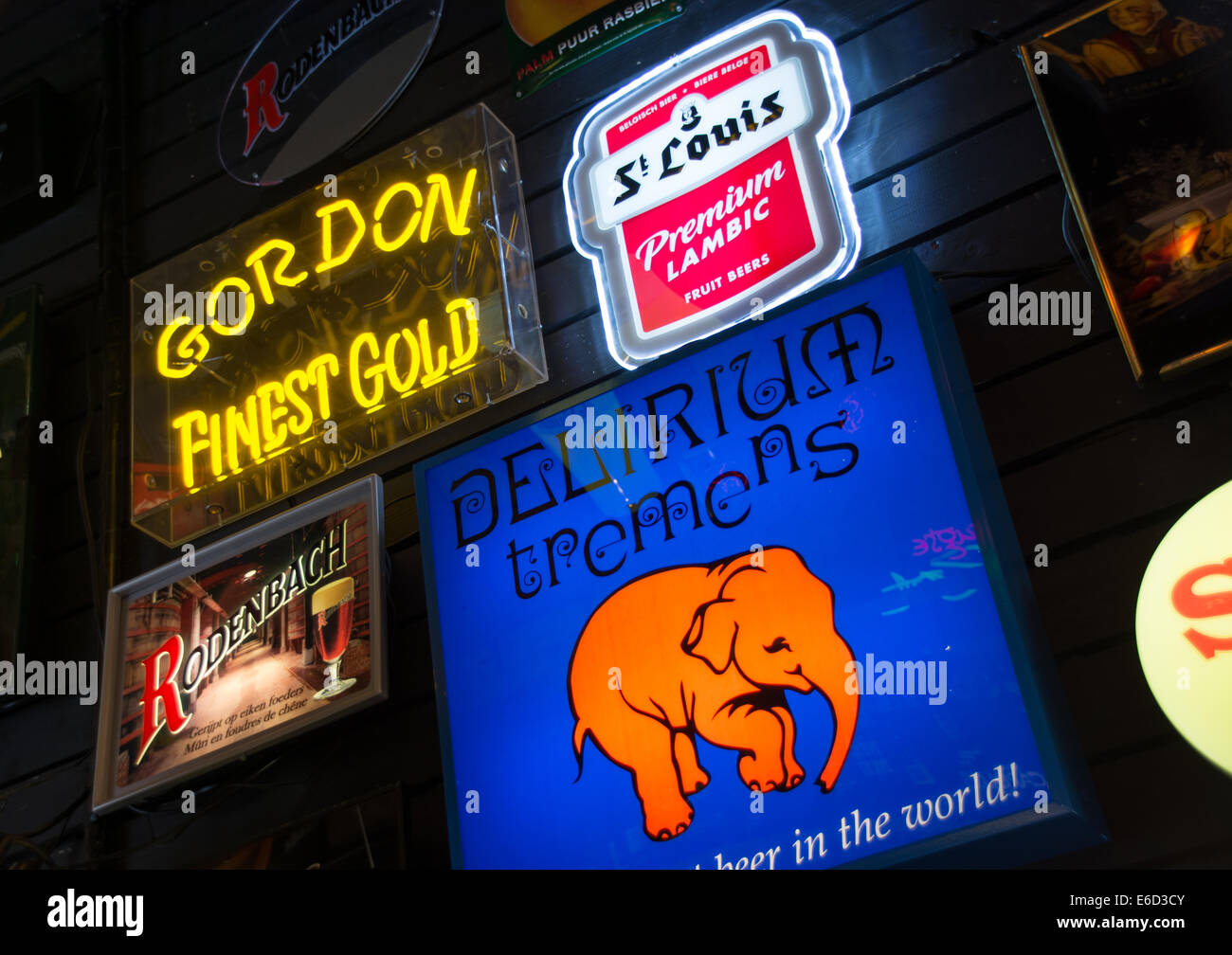 Illuminated signs inside the Beerwall pub, Bruges. Stock Photo