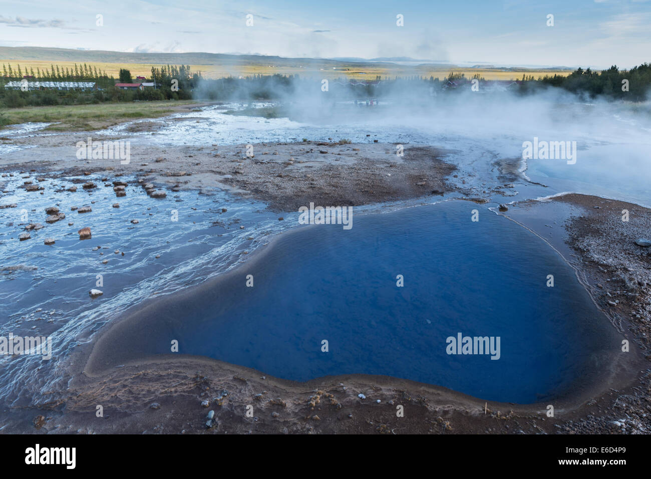 Bioluminescent, geothermal pool next to the Strokkur geyser, in Thingvellir National Park, Iceland. Stock Photo
