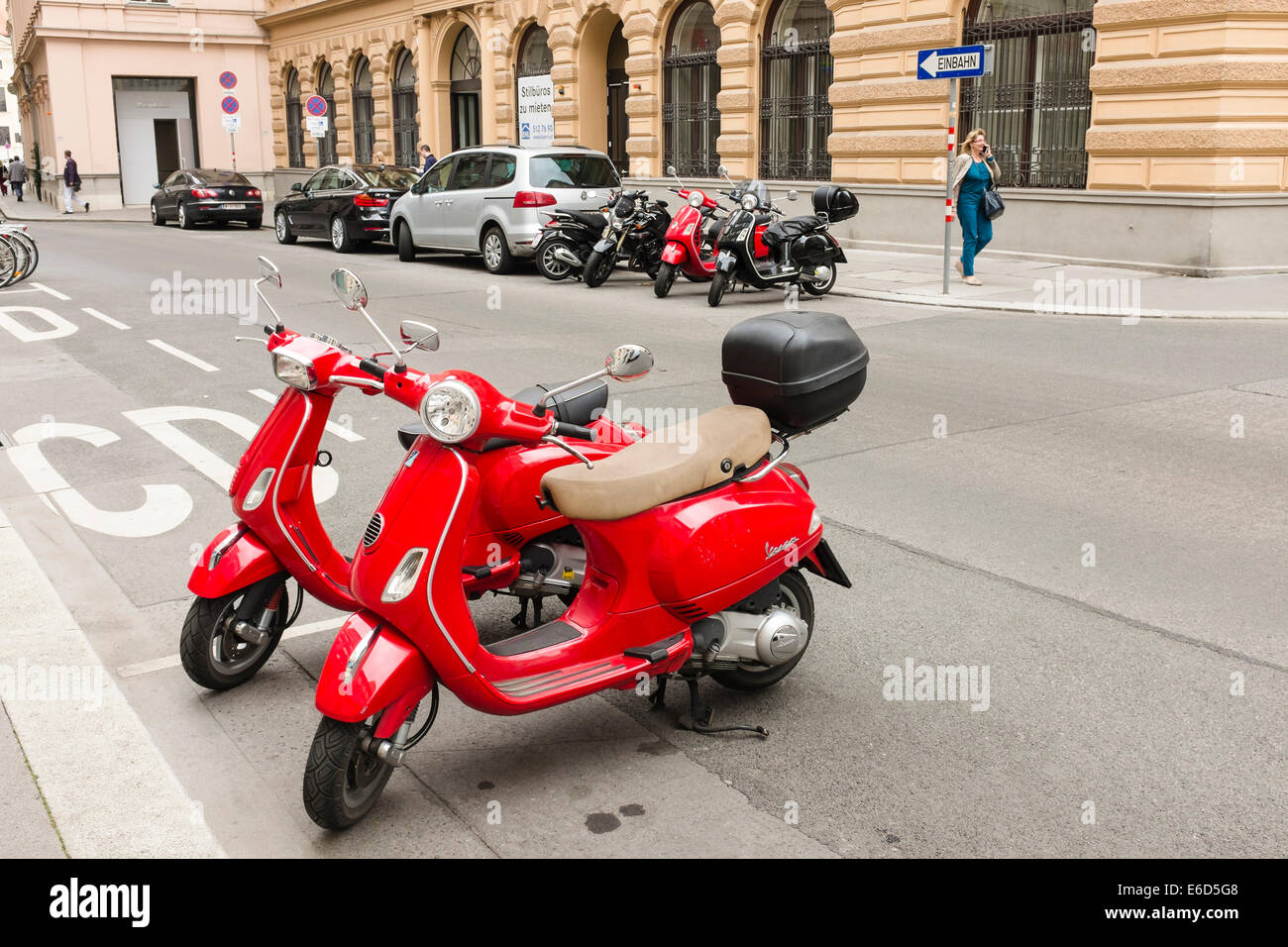 Two red Vespa scooters, Vienna Stock Photo Alamy