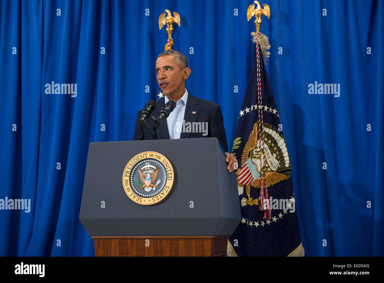 MA, US. 20th Aug, 2014. United States President Barack Obama makes remarks on the murder of journalist James Foley by ISIS at the press filing center at the Edgartown School in Edgartown, Martha's Vineyard, MA on August 20, 2014. Credit:  dpa picture alliance/Alamy Live News Stock Photo