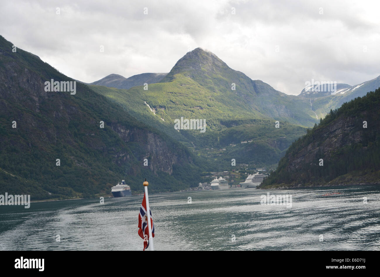 Geiranger fjord in southern Norway is one of the most beautiful fjords. The sheer cliffs rise straight from the water. Stock Photo