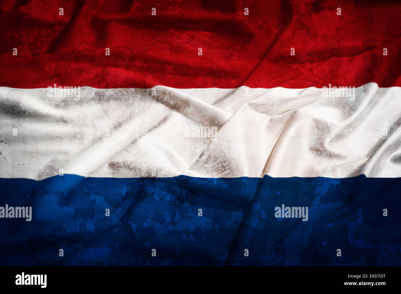 Netherlands  grunge old flag on a silk drape Stock Photo
