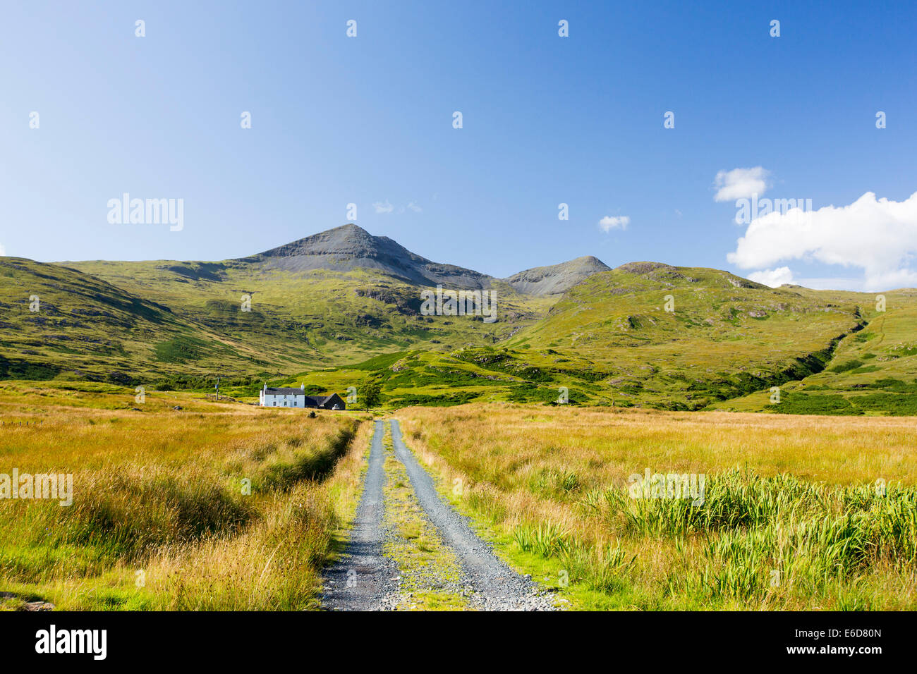 An isolated house beneath Ben More on Mull, Scotland, UK. Stock Photo