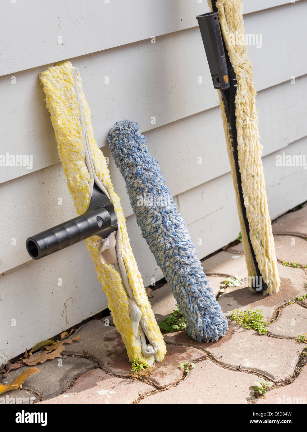 Window cleaning applicators drying out after cleaning windows Stock