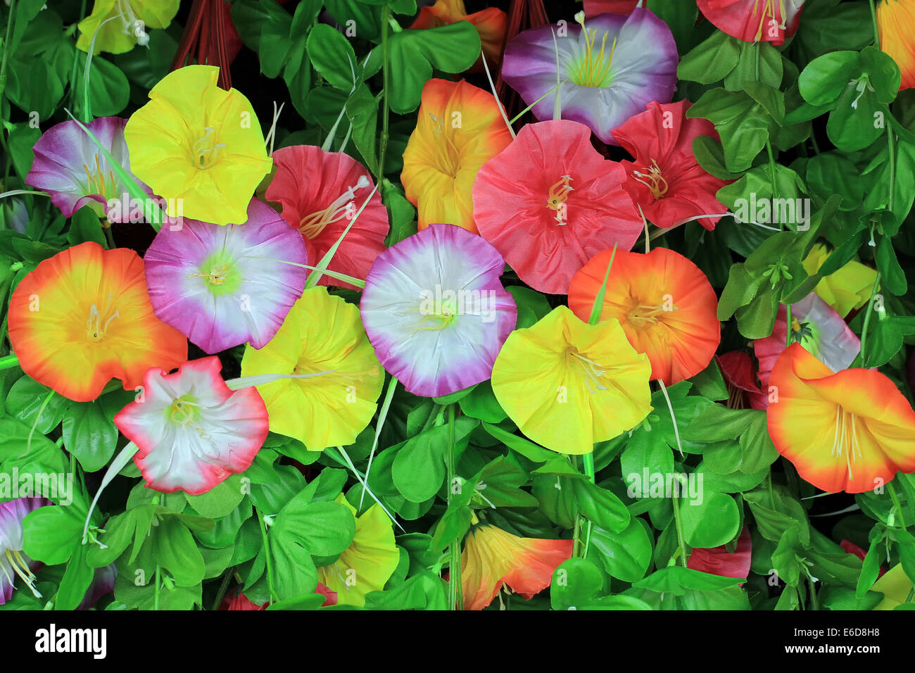 colorful of decoration artificial flower as background Stock Photo