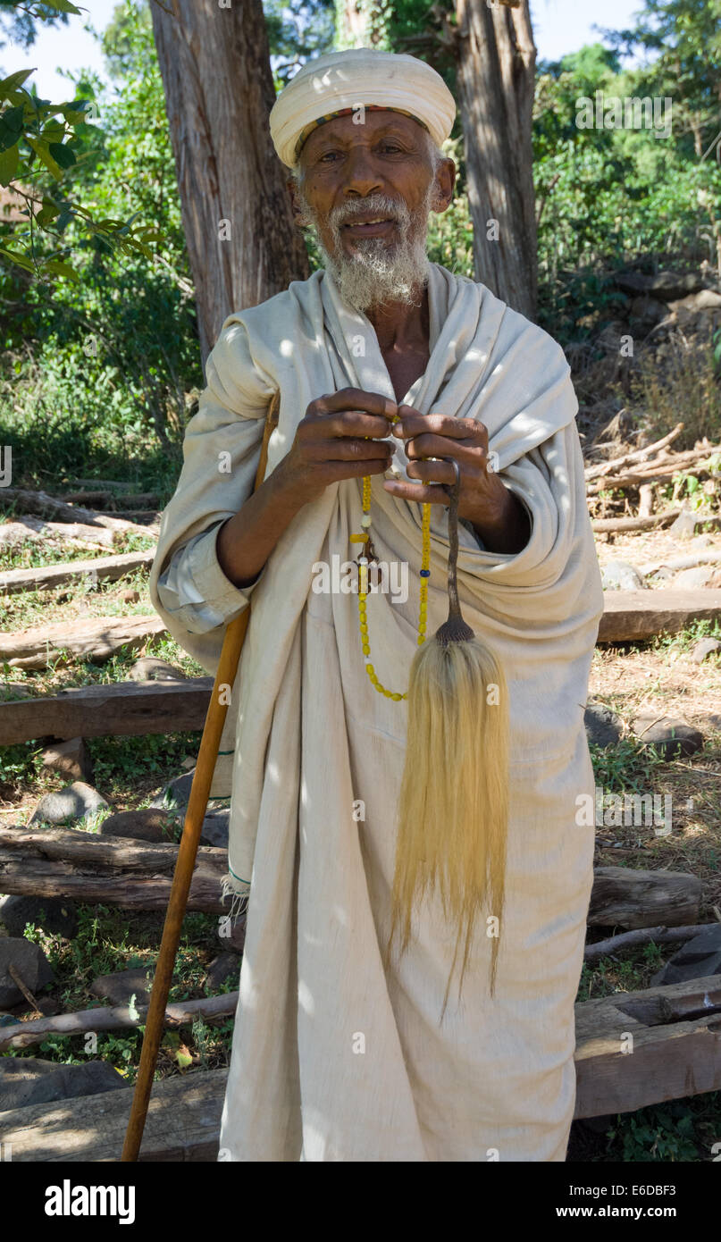 Pilgrim with prayer beads in the grounds of Ura Kidane Mehret church on Zege Peninsula, Lake Tana, Bahir Dar, Ethiopia Stock Photo