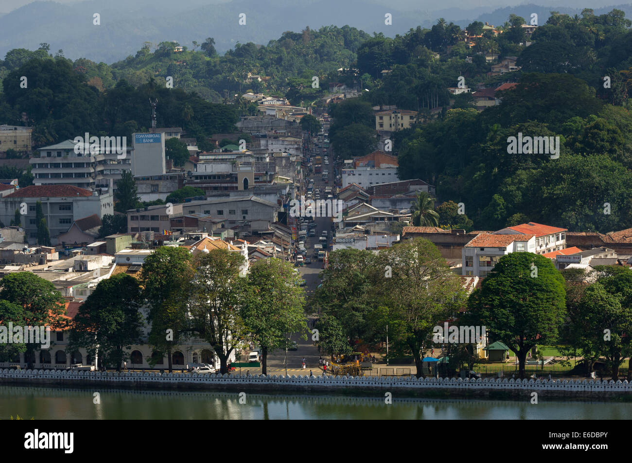 Looking down onto the bustling city and the waterfront of Kandy Lake, Kandy, Sri Lanka Stock Photo